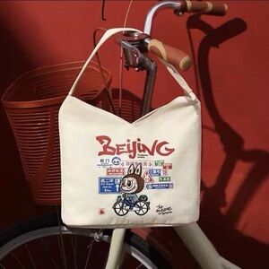 Beijing Graphic Canvas Shoulder Bag in Cream